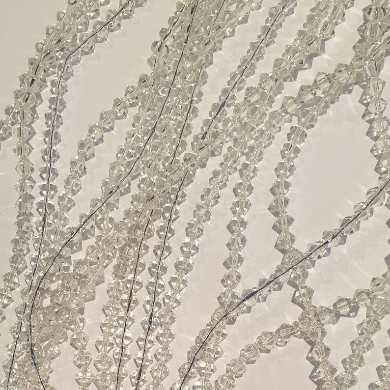 centre drill Wholesale 17x Strands x17 Strands 6mm Clear Bicone Glass Beads x57 beads pstrand bicone glass beads