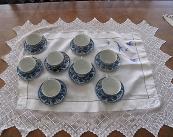 Hand embroidered tray cloth with lace edge