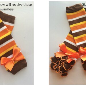 May include: Two pairs of baby leg warmers. The leg warmers have brown, orange, yellow, and white stripes. The leg warmers have orange bows and brown ruffles. Text on the image says "Sizes 3 months and below will receive these SMALL legwarmers" and "Sizes 6 months and above will receive these ONE-SIZED legwarmers."