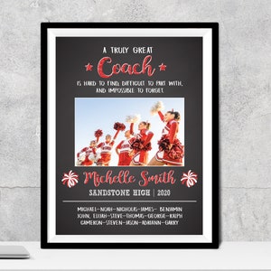 May include: A black and white framed print with a red glitter design. The print features a photo of a cheerleading squad and the text "A truly great *Coach* is hard to find, difficult to part with, and impossible to forget."  The print also includes the name "Michelle Smith" and the text "Sandstone High | 2020".