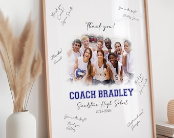 May include: Framed print with a light wood border. The print features a team photo with the text "Thank you!" and "Coach Bradley Sandstone High School 2025-2026." Handwritten messages surround the photo, adding a personal touch.