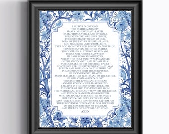 May include: Framed print featuring the text of a religious creed, surrounded by a blue floral border. The text is centered on a white background, with the black frame adding a classic touch. The floral design adds a decorative element.
