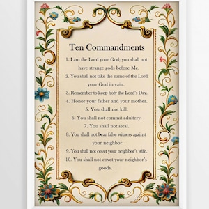 May include: A framed print featuring the Ten Commandments. The text is displayed in a classic font, surrounded by ornate gold and floral embellishments. The frame is white, and the overall design is traditional and decorative.