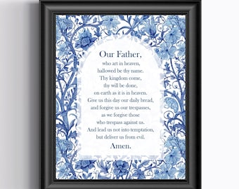 May include: Framed print featuring the Lord's Prayer. The text is centered on a white background, framed by a blue floral design. The frame is black.