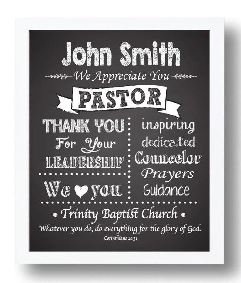 May include: Black and white chalkboard sign with the text "John Smith - We Appreciate You - PASTOR" and a list of reasons to appreciate the pastor, including "inspiring", "dedicated", "counselor", "prayers", "guidance", and "Trinity Baptist Church". The sign also includes the quote "Whatever you do, do everything for the glory of God. Corinthians 10:31".