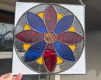 Sunflower Stained Glass panel featuring a basketball in the middle.