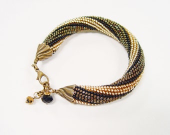 bead crochet rope bracelet. Gold black brown bold bracelet. Beaded  jewelry. Hand crocheted. Beadwork