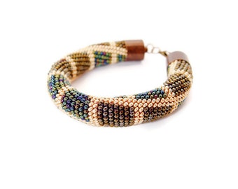 bead crochet rope bracelet. Gold green brown bold bracelet. Beaded multicolor jewelry. Hand crocheted