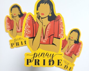 May include: Three yellow stickers with a red and white illustration of a woman wearing a traditional Filipino dress. The text "pinay PRIDE" is on the bottom sticker.