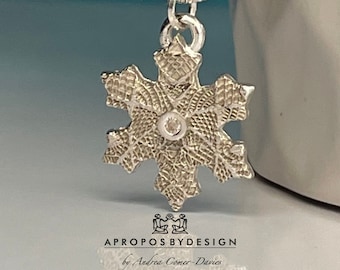 Silver snowflake pendant necklace with textured snowflake design and cubic zirconia in the center, fine silver, 16-18 inch sterling chain