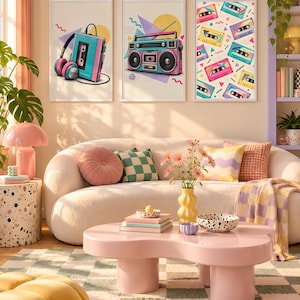May include: Three framed wall art prints featuring retro electronics. The left print shows a teal cassette player with pink headphones. The center print displays a teal boombox. The right print features a pattern of colorful cassette tapes.