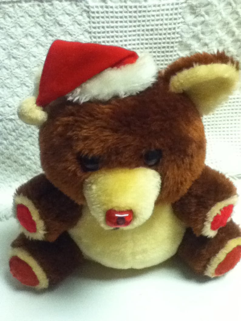 Singing Teddy Bear Osito Singing Christmas Songs Vintage Peek A Boo Holidays Santa hat.