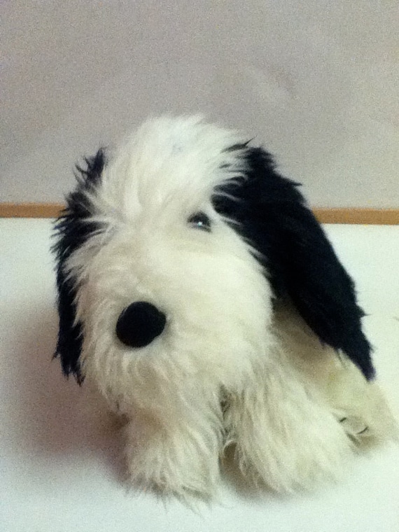 black and white dog stuffed animal