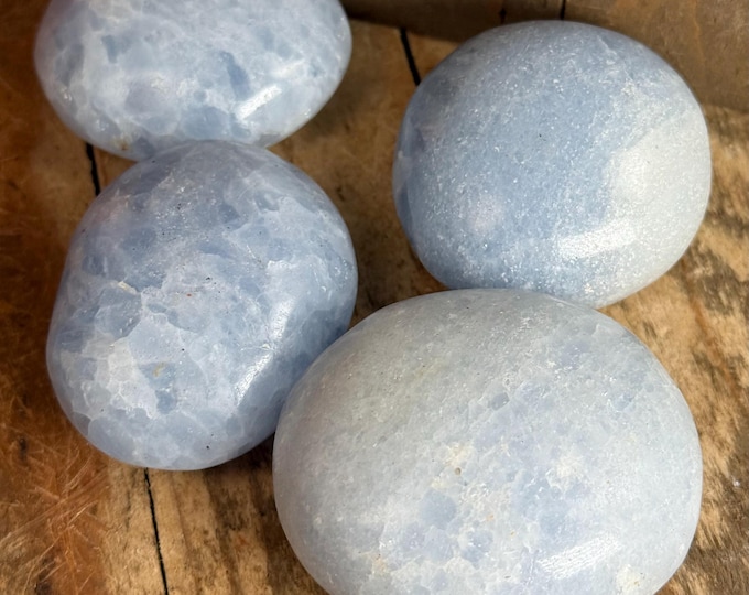 one  Blue Calcite Hand Carved Crystal Blue Calcite palm stone Specimen has imperfections a024