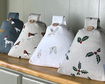 Christmas Fabric Doorstop. Handmade in Sophie Allport Christmas fabrics Robin, Reindeer Stags, Owls prints.