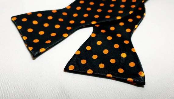Polyester Self Tie Bow Tie with Orange Polka Dot. Adjustable up  20 inches.