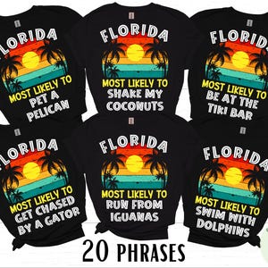 May include: Black t-shirts with a Florida-themed graphic featuring a sunset, palm trees, and phrases like "Most Likely to Pet a Pelican" and "Most Likely to Shake My Coconuts." The image includes 20 phrases.