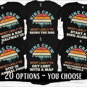 May include: A set of six black t-shirts with a retro sunset graphic and the text "Hike Crew" and a funny hiking-related phrase. The phrases are: "Most Likely to Need a Nap Halfway Up", "Most Likely to Bring the Dog", "Most Likely to Start a Sing-Along", "Most Likely to Step in Animal Poop", "Most Likely to Get Lost With a Map", and "Most Likely to Make Friends With the Animals".