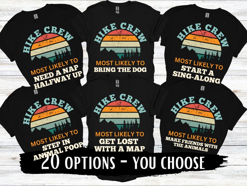 May include: A set of six black t-shirts with a retro sunset graphic and the text "Hike Crew" and a funny hiking-related phrase. The phrases are: "Most Likely to Need a Nap Halfway Up", "Most Likely to Bring the Dog", "Most Likely to Start a Sing-Along", "Most Likely to Step in Animal Poop", "Most Likely to Get Lost With a Map", and "Most Likely to Make Friends With the Animals".