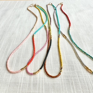 Thin beaded necklace, brightly colored