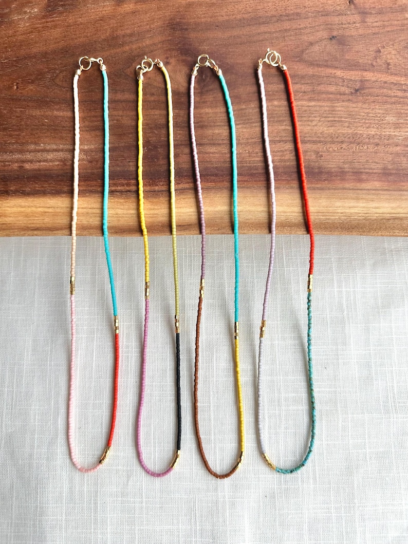 Wide shot of all 4 necklaces.