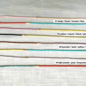 Each necklace with the color name