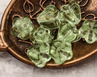 7320W (50)   - 4x6mm Transparent Peridot Czech Bell Flower Beads