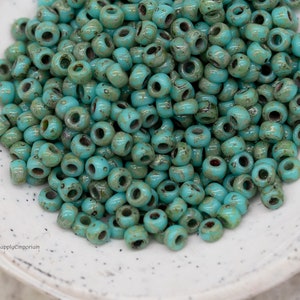 11-4514, Miyuki 22g Op Turquoise Blue Picasso 11-4514, Miyuki 22g Op Turquoise Blue Picasso