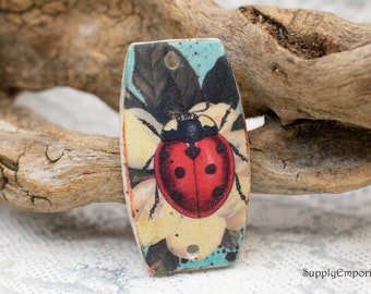 CLAY 2372, Ladybug On Magnolia Faux Tin Polymer Clay Connector, 1 Piece, 44x25mm 2 Hole Image Transfer Polymer Clay Connector