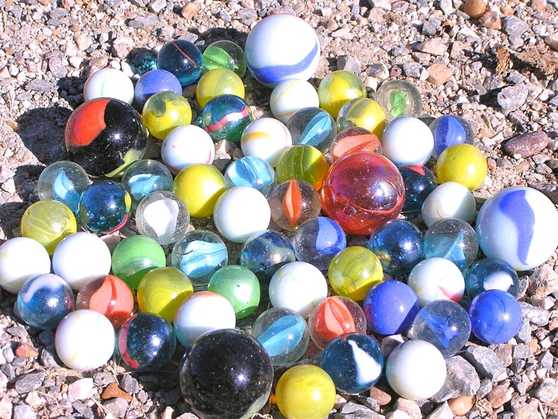 Sixty-two glass marbles Mixed lot BIG and small 58 to 1 New Old stock