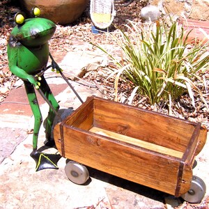 Metal Frog Lawn sculpture with primitive wood cart, Garden Yard Art, Junk Iron
