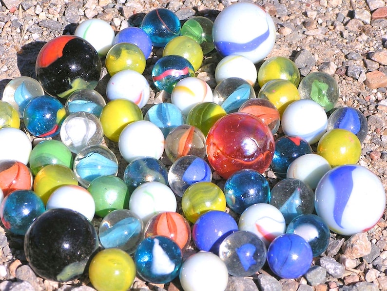 Sixty-two glass marbles Mixed lot BIG and small 58 to 1 New Old stock