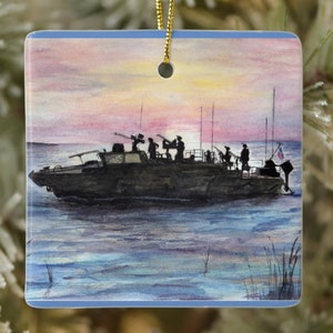 May include: A watercolor painting of a military boat with soldiers on board, sailing on a body of water at sunset. The sky is a mix of pink, orange, and purple. The boat is dark gray and has a flag on the back.