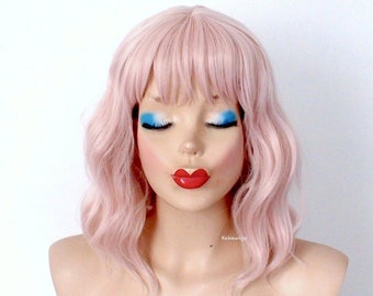 Pastel Antique Pink wig. 16" Wavy wig with bangs. Heat friendly synthetic hair wig.