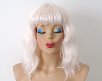 White blonde wig. 16" Wavy wig with bangs. Heat friendly synthetic hair wig.