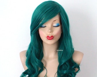 May include: A long, teal green wig with loose curls. The wig has a side part and is styled with a side bang.