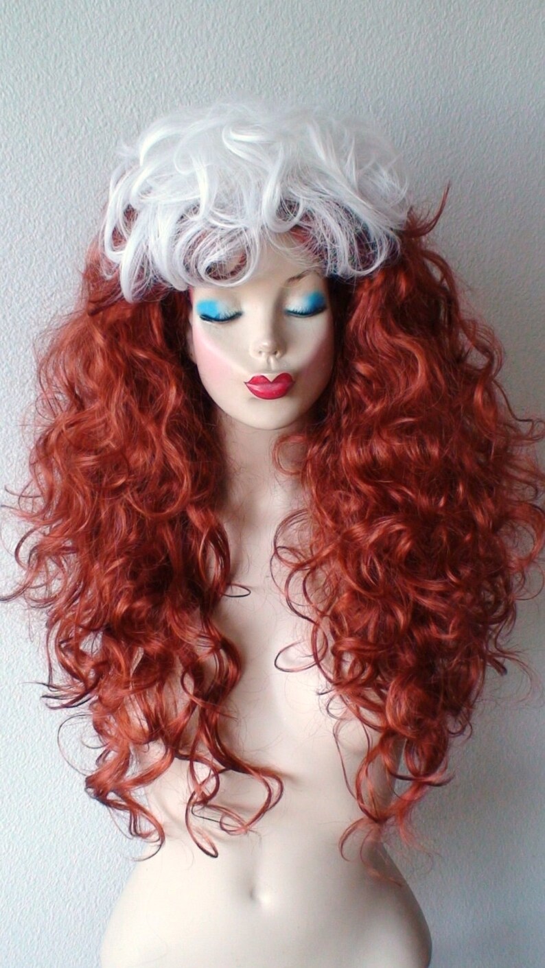 May include: A long, curly wig with red and white hair. The wig has a white top layer and a red bottom layer. The wig is styled in loose curls.