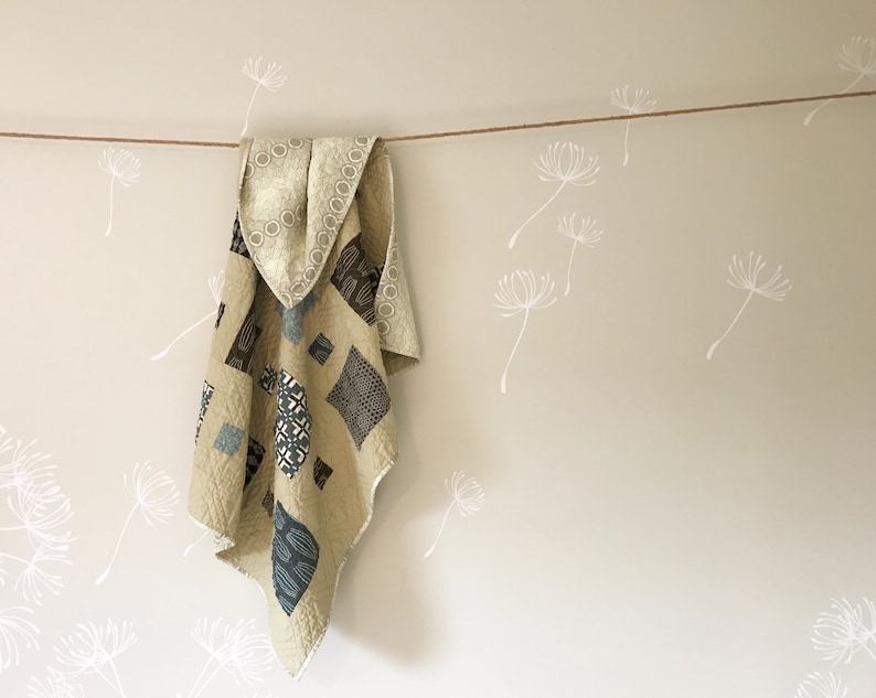 Scout Patches crib quilt in Parson Gray