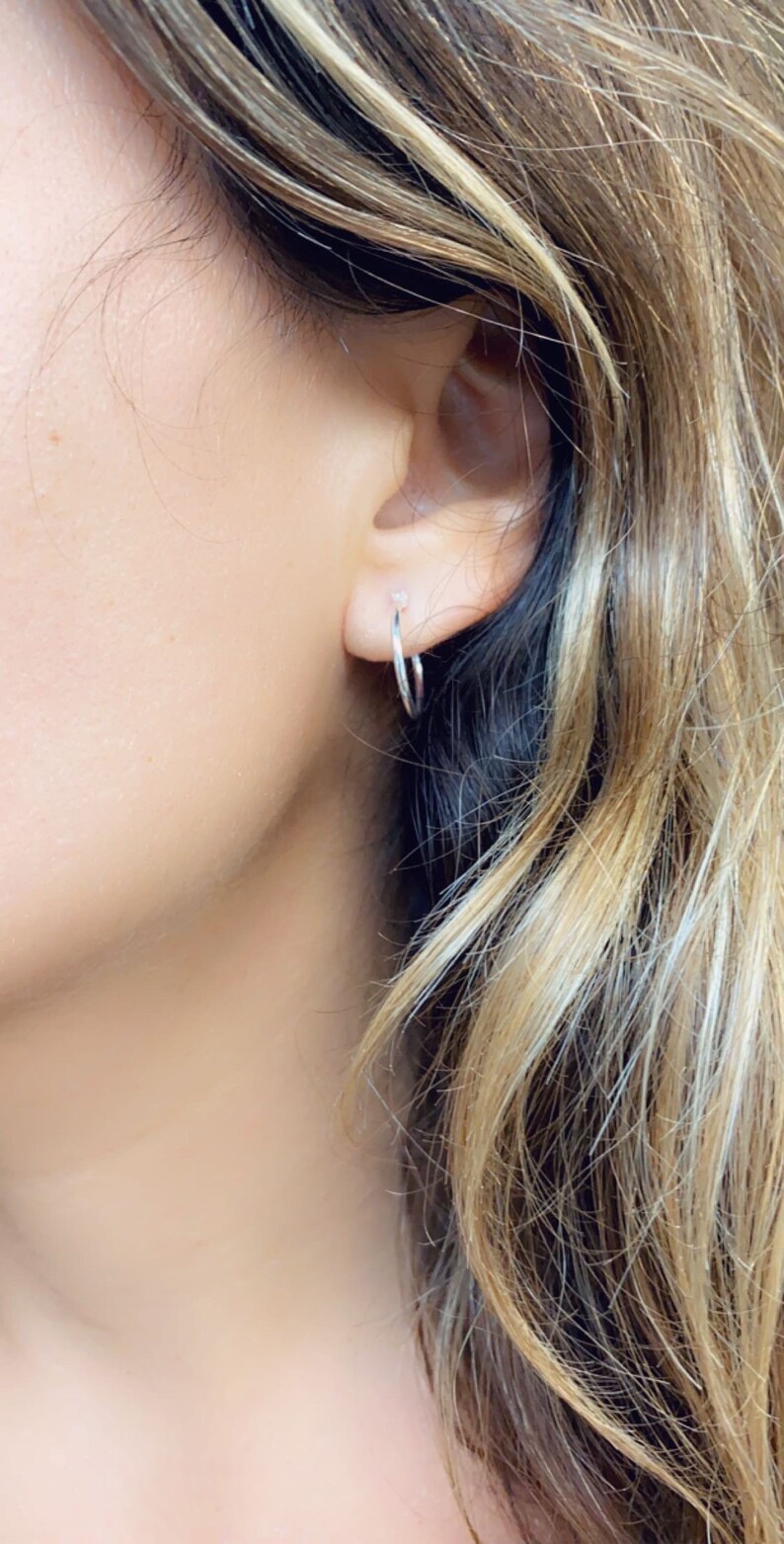 delicate silver hoop earrings