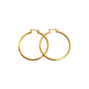 May include: A pair of gold hoop earrings. The earrings are simple and classic, and they would be a great addition to any jewelry collection.
