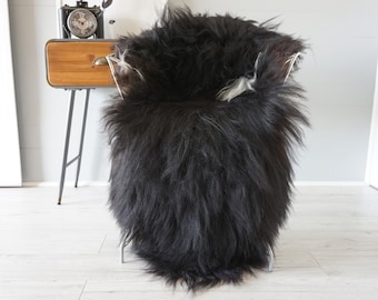 Black Icelandic Sheepskin Rug: Ethically Sourced Long Wool Throw (53x31")