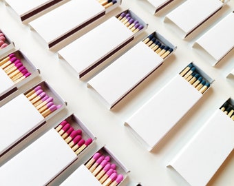 25 white plain matchboxes with different color matches inside/ one head color per matchbox