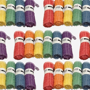 May include: A repeating pattern of rolled, textured cleaning cloths in various colors including red, orange, yellow, green, blue, and purple. Each cloth is secured with a white paper band featuring the text Earth Craft printed in black.
