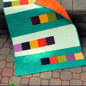 Fast Five Patch quilt pattern - easy quilt pattern of basic blocks for a new quilter who loves handmade baby gifts