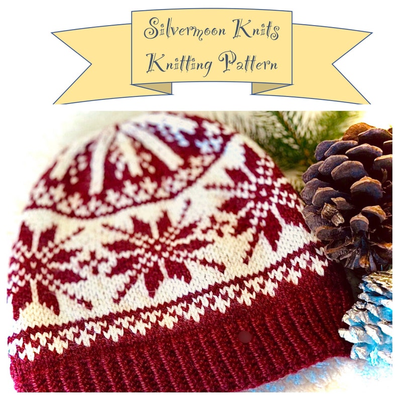 May include: A knitted hat with a snowflake pattern in burgundy and cream. The hat has a ribbed brim and a detailed design. The text "Silvermoon Knits Knitting Pattern" is displayed above the hat.