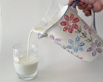 Hand painted ceramic pitcher for milk, painted with multi coloured flowers,ceramic milk bag holder, hand made pitcher, Canadian milk bag,