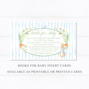 May include: A baby shower insert card with a watercolor design. The card features a blue and white striped background, with a floral and carrot border. The text reads "Books for Baby" and other details about the request.