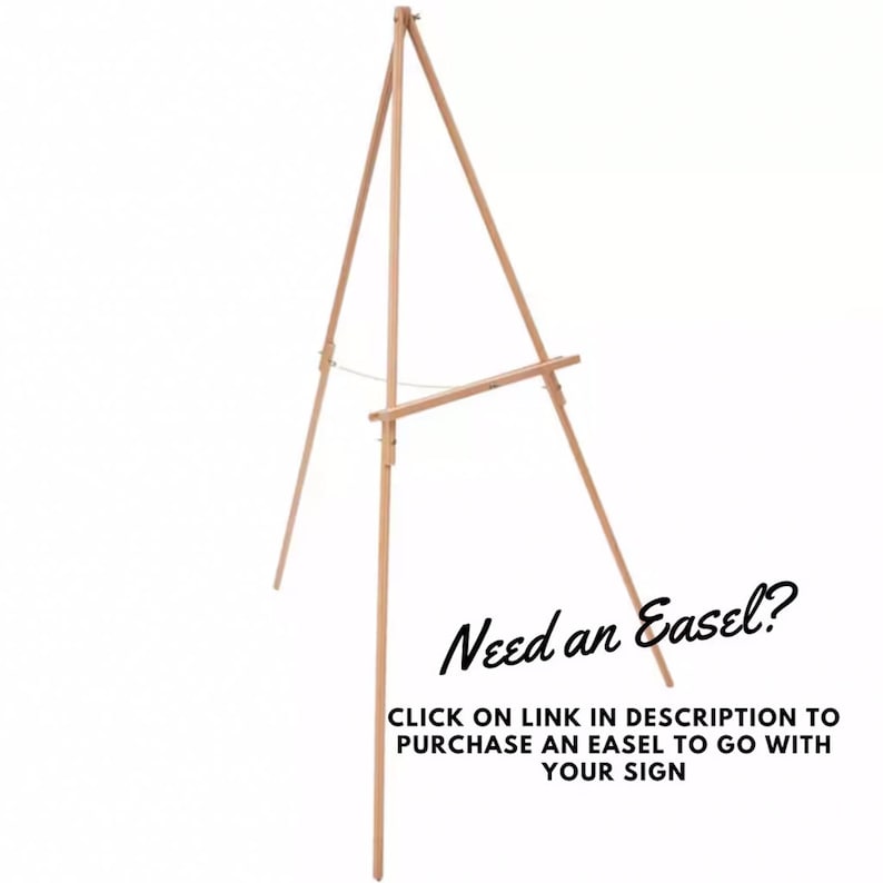 May include: A wooden easel with three legs and a horizontal bar for displaying a sign. The text "Need an Easel? CLICK ON LINK IN DESCRIPTION TO PURCHASE AN EASEL TO GO WITH YOUR SIGN" is written below the easel.