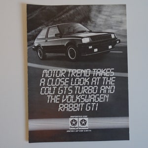 1984 Original &quot;Motor Trend takes a look at the Colt GTS and the Volkswagen Rabbit GTI&quot; Dealer Handout Sales Brochure