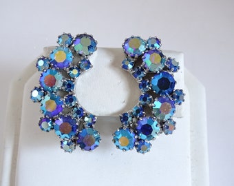 Weiss Blue Aurora Borealis Crescent Shaped Round Faceted Rhinestone Clip Earrings on a Silver Tone Setting - Vintage Weiss Clip on Earrings